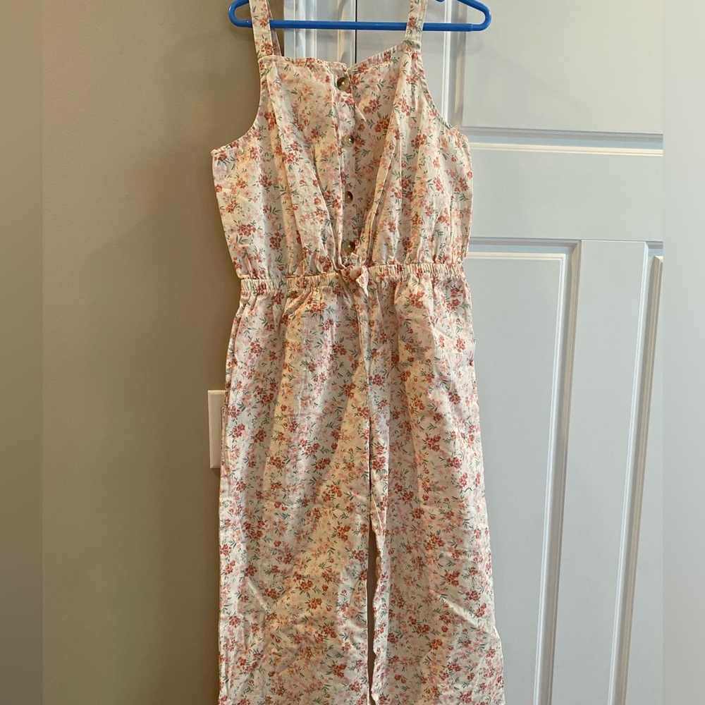 New without tags. Never worn floral romper SZ 10